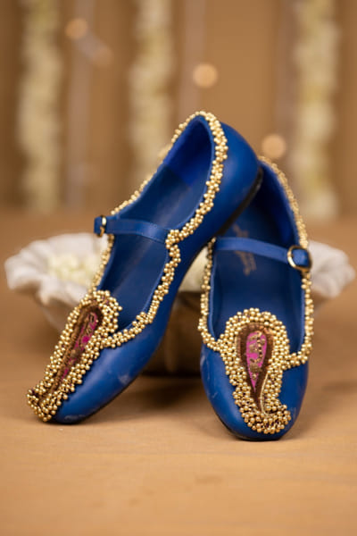 Blue bead encrusted Mary Jane shoes