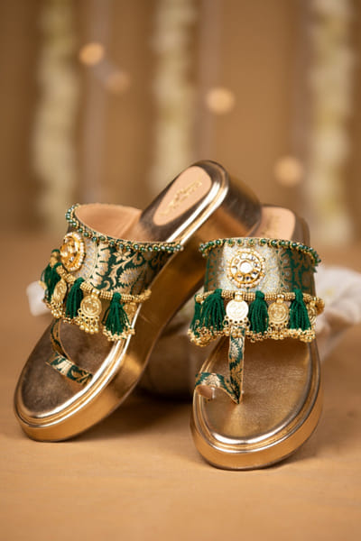 Gold tasselled brocade wedges