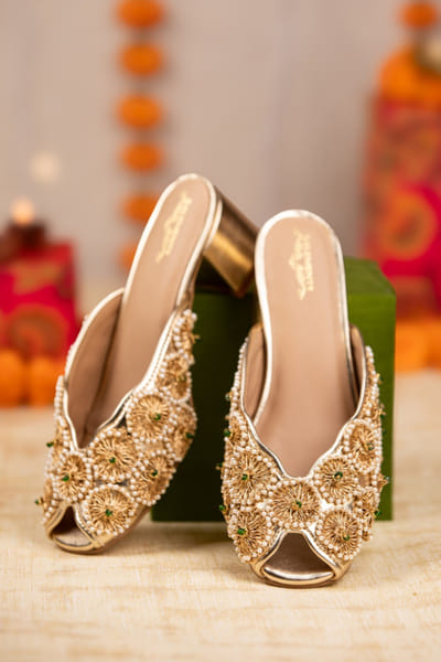 Gold floral embroidered mule heels