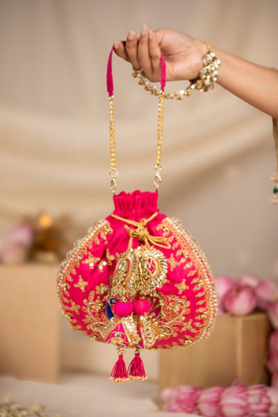 Pink embroidered potli bag
