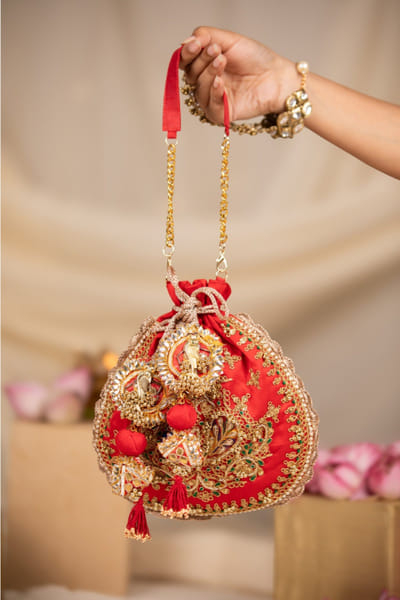 Red embroidered potli bag