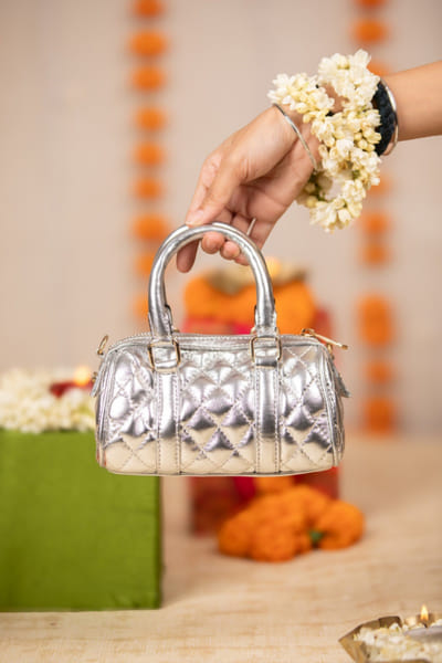 Silver quilted metallic handbag
