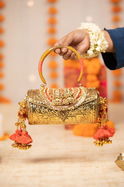 Gold embossed metal handbag