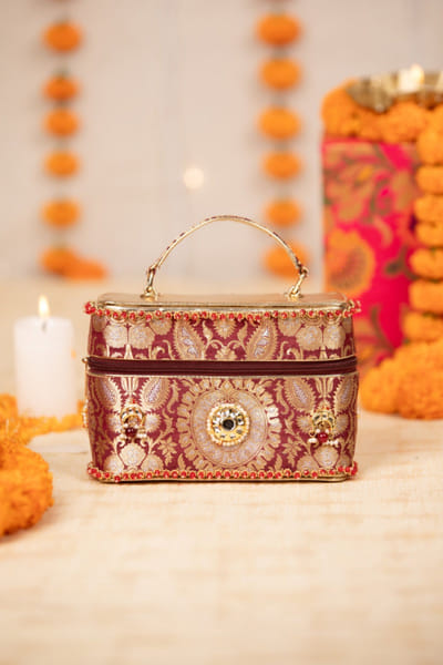 Maroon brocade handbag