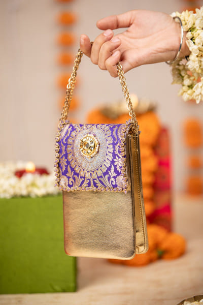 Purple and gold kundan handbag