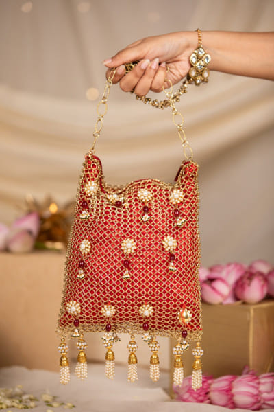 Red mesh pearl potli bag