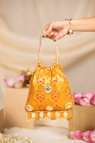Yellow zari potli bag