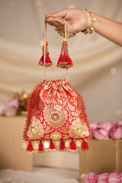 Red mirror embroidered potli bag