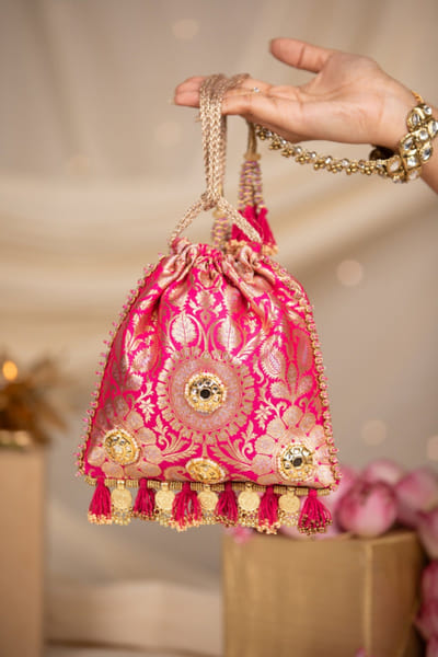 Pink mirror embroidered potli bag