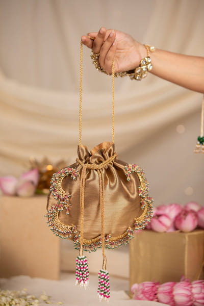 Champagne gold satin potli bag
