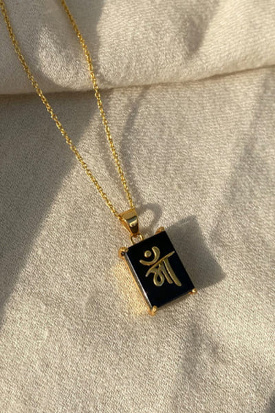 Gold plated black onyx pendant and chain