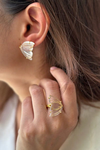 Gold plated stone studded hand carved ring