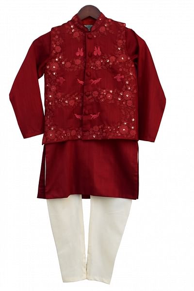 Maroon emboirdered Nehru jacket with kurta and churidar