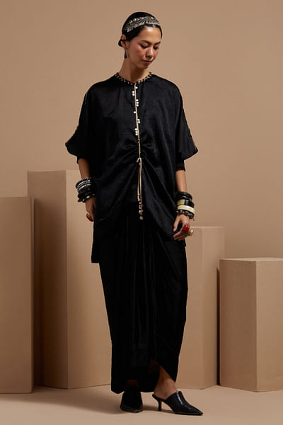 Black short kurta and pleated skirt