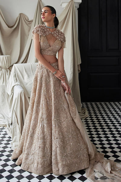 Beige embellished cape lehenga set