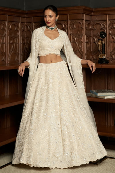Ivory applique embellished lehenga set