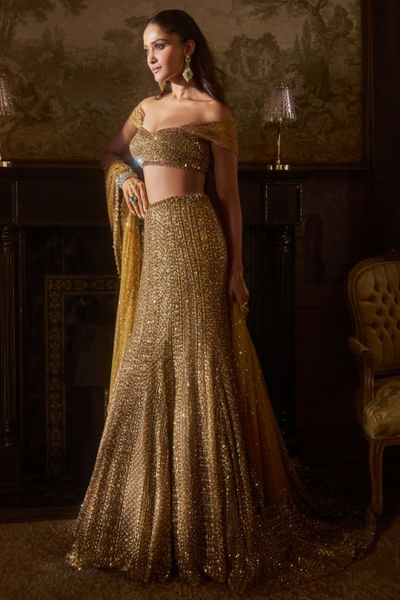 Antique gold embroidered trail lehenga set