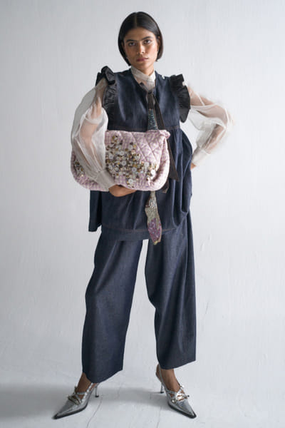 Salmon button and metal embellished bag