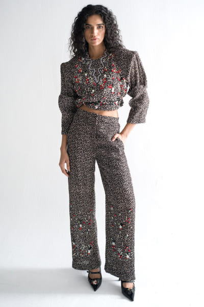 Black metal embellished pants