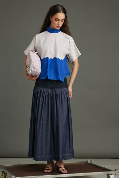 Blue pleated denim skirt