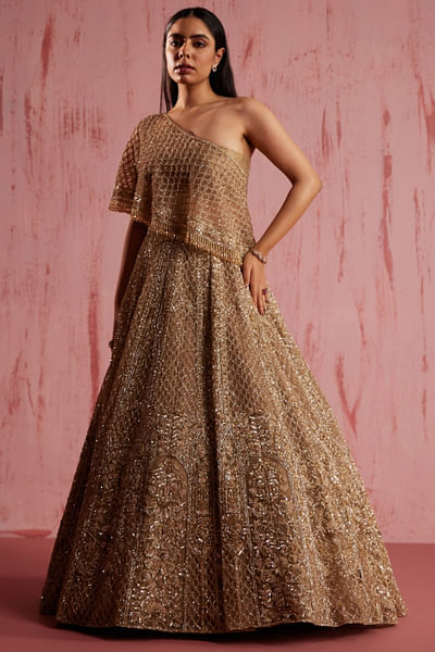 Gold embroidered cape lehenga set