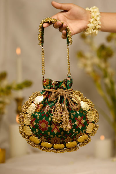 Green bead embroidered potli bag