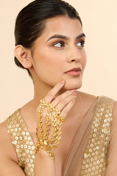 Gold lotus hand harness