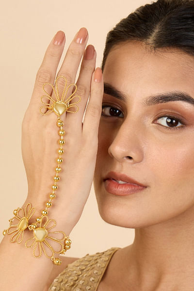 Gold floral petal hand harness