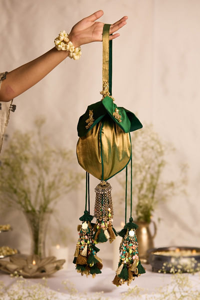 Green gold multi-tiered tassel potli bag