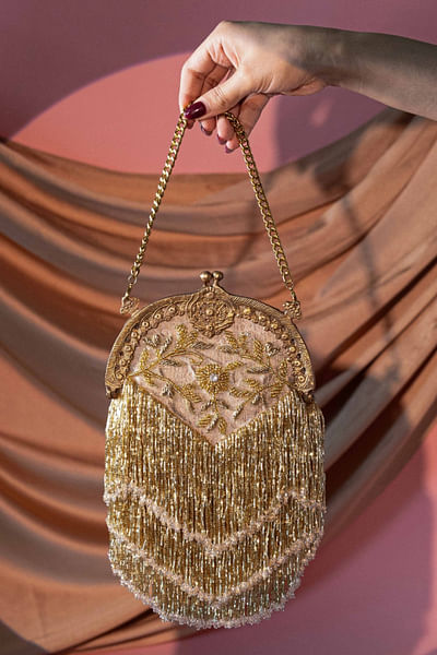 Gold floral embroidered tassel potli bag