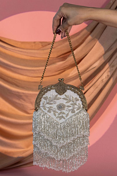 Silver floral embroidered tassel potli bag