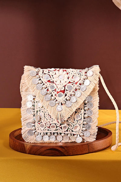 Off-white coin embellished mini clutch