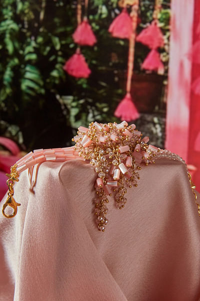 Pink pearl and bead embellished bracelet