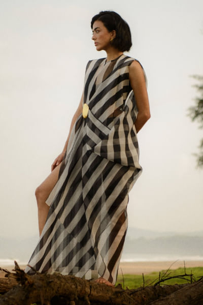 Black and white striped overlay and jumpsuit