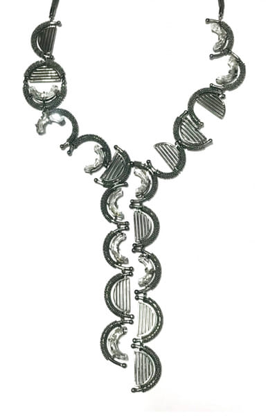 Silver and black waning moon necklace