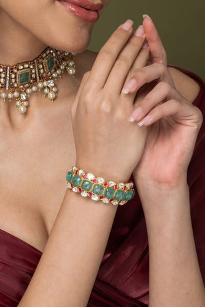 Green and gold stone embellished bangle
