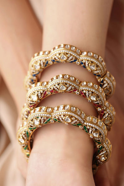 Red and white stone embellished floral bangle