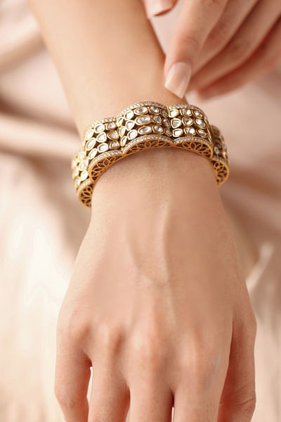 Gold floral stone embellished bangle