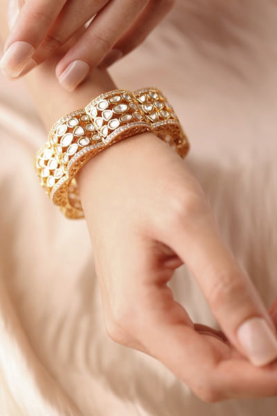 Gold floral kundan polki embellished bangle