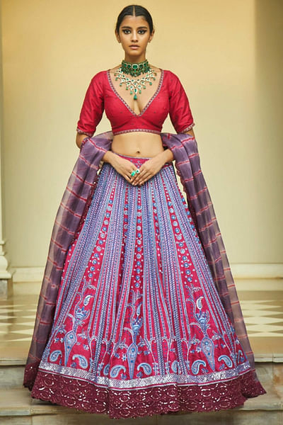 Red and blue embroidered lehenga set