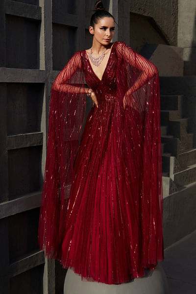 Wine sequinned cape gown