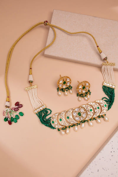 Green emerald stone and polki choker set