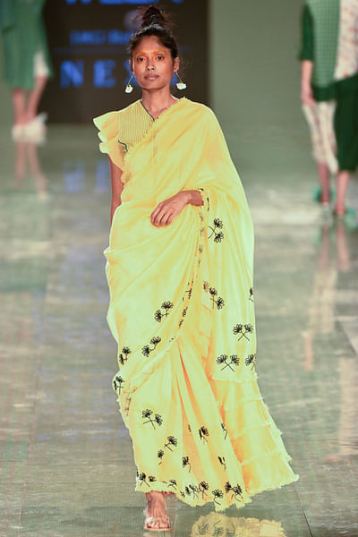Yellow embroidered sari