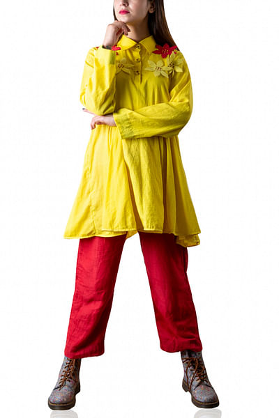 Yellow blouson and red pants
