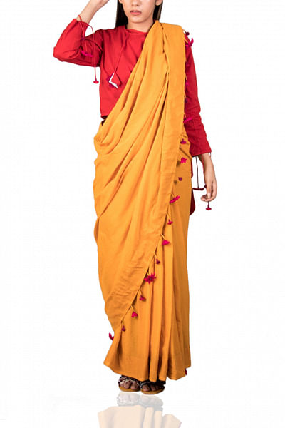 Yellow sari with floral tassels