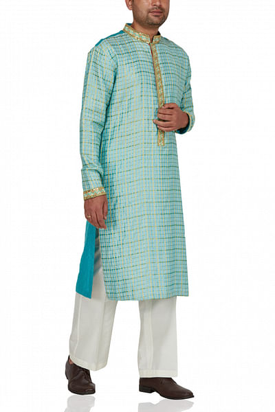 Check kurta with gold trim and ivory pants