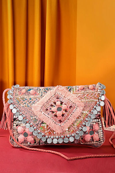 Pink coin embellished clutch