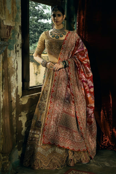 Kajal's Couture Antique gold hand embroidered lehenga set KAJAJUN26D148194
