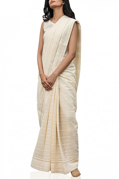 Off-white lace bordered sari