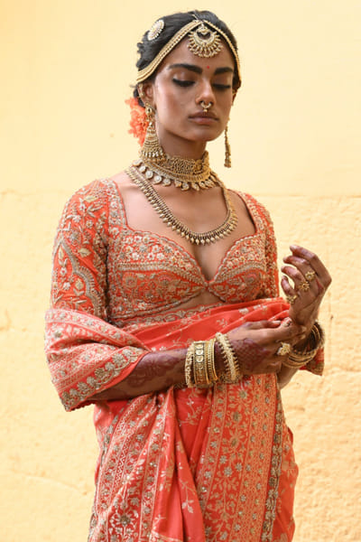 Orange dori and zardozi embroidered blouse